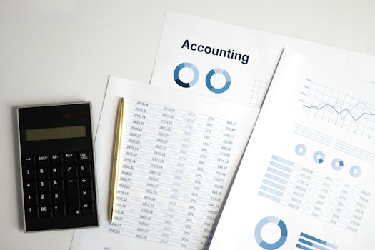 A calculator and financial documents