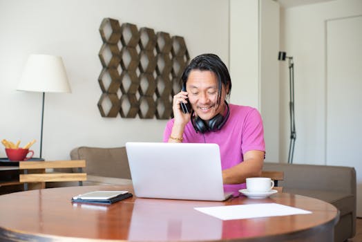 a person using a laptop to work from home