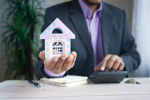 calculator and house model